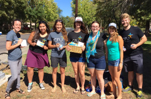 Some of the 13 staff and students helping pass out snacks to women looking for a sorority house to join.